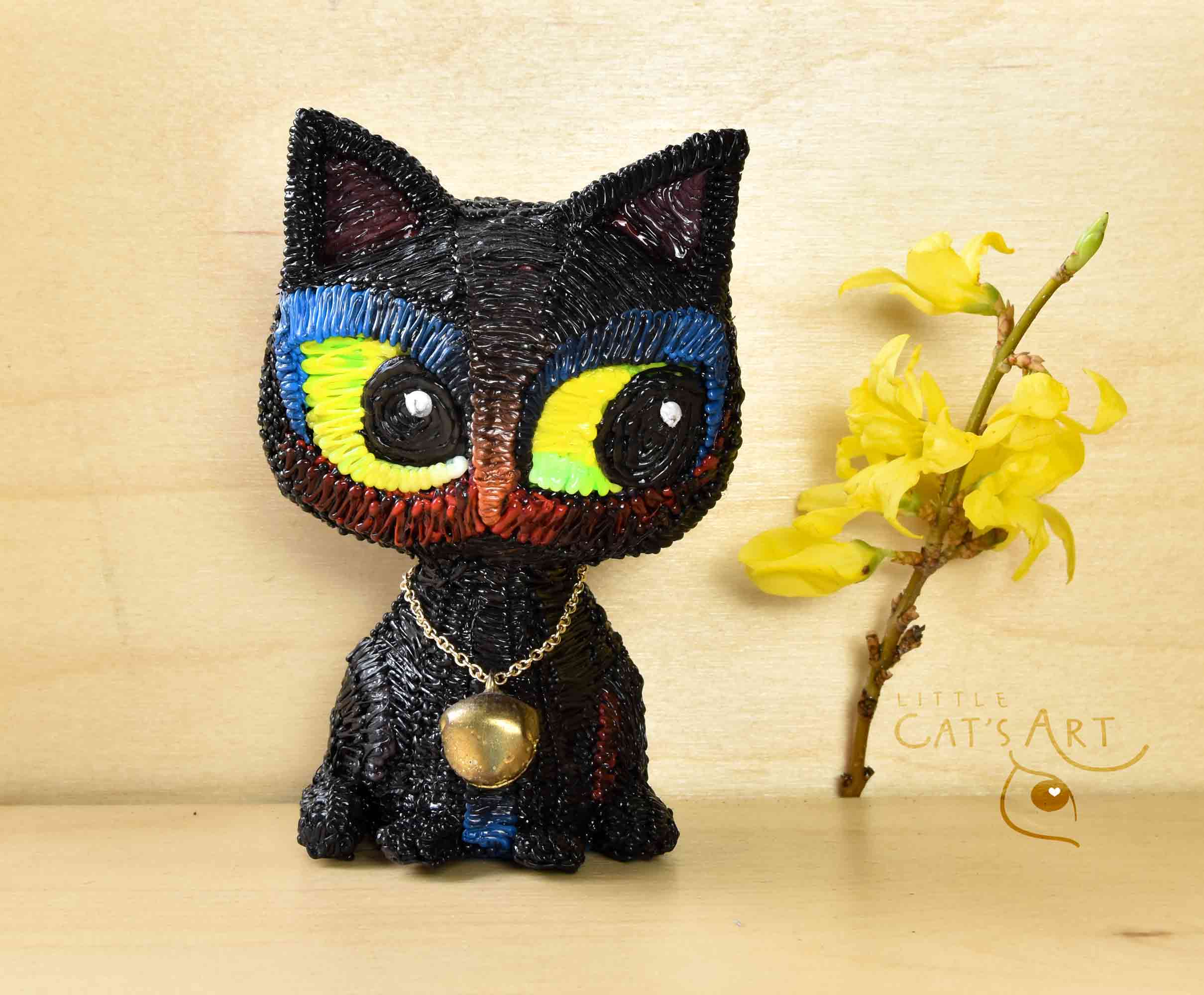 Lucky black cat figure with mini bell jewellery