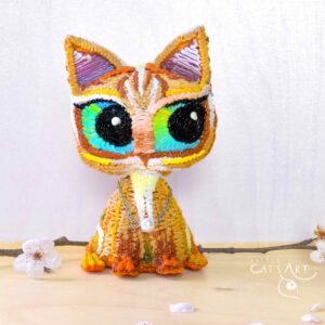 Ginger tabby cat figurine with mini pearl necklace