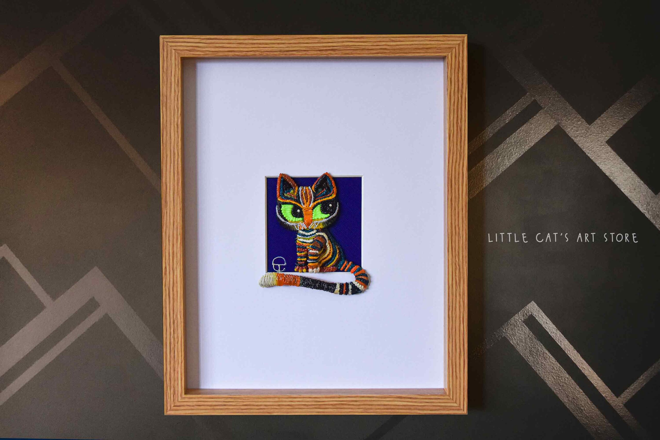 Modern Tabby cat sculpture in frame
