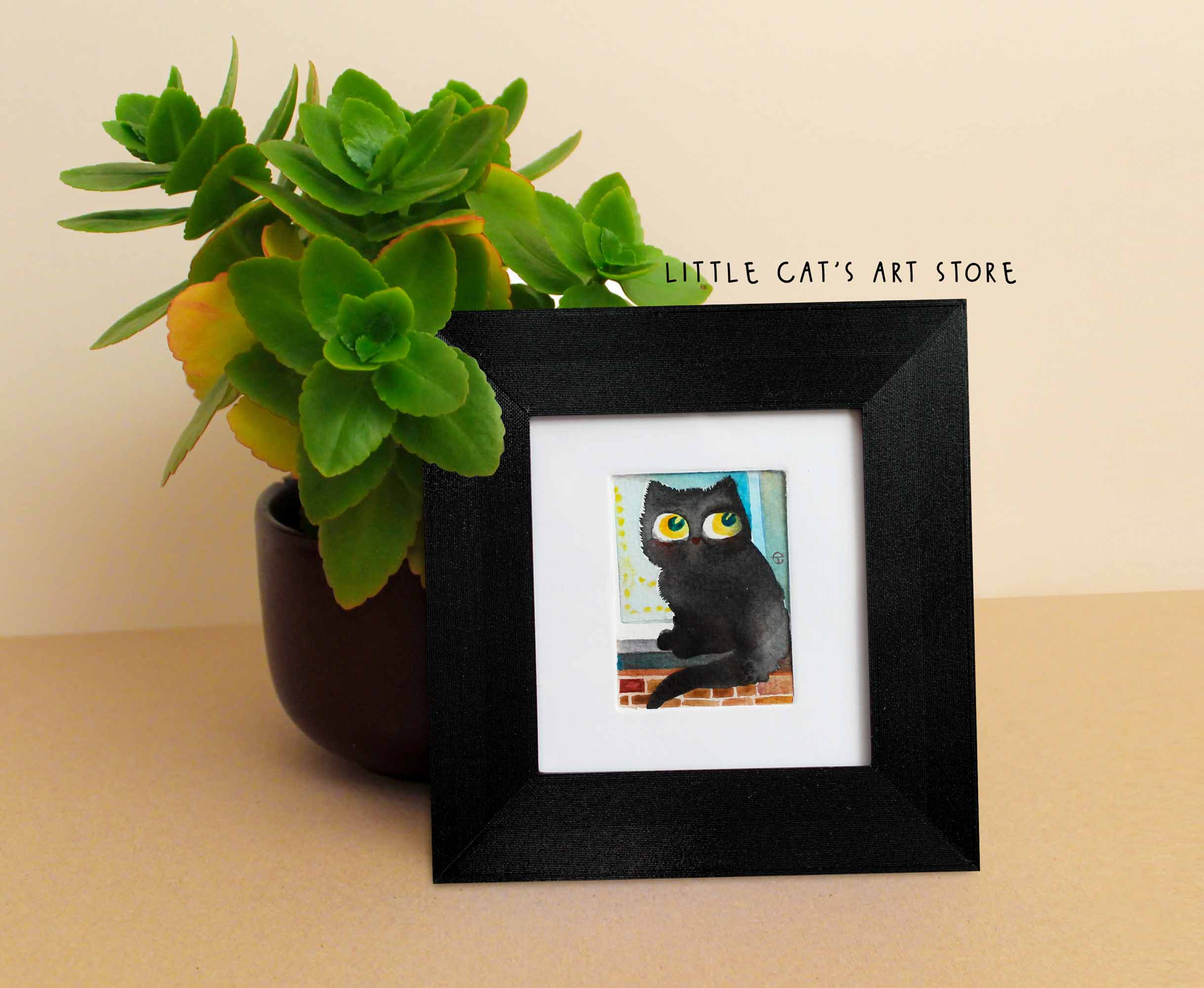 Black cat gossiping on the window sill