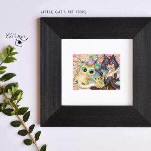Happy cat family climbing on spring tree print in black frame
