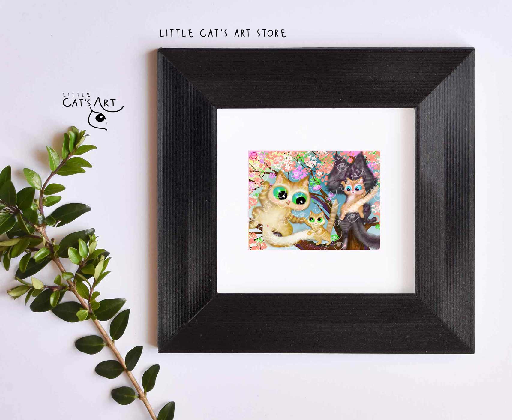 Happy cat family climbing on spring tree print in black frame