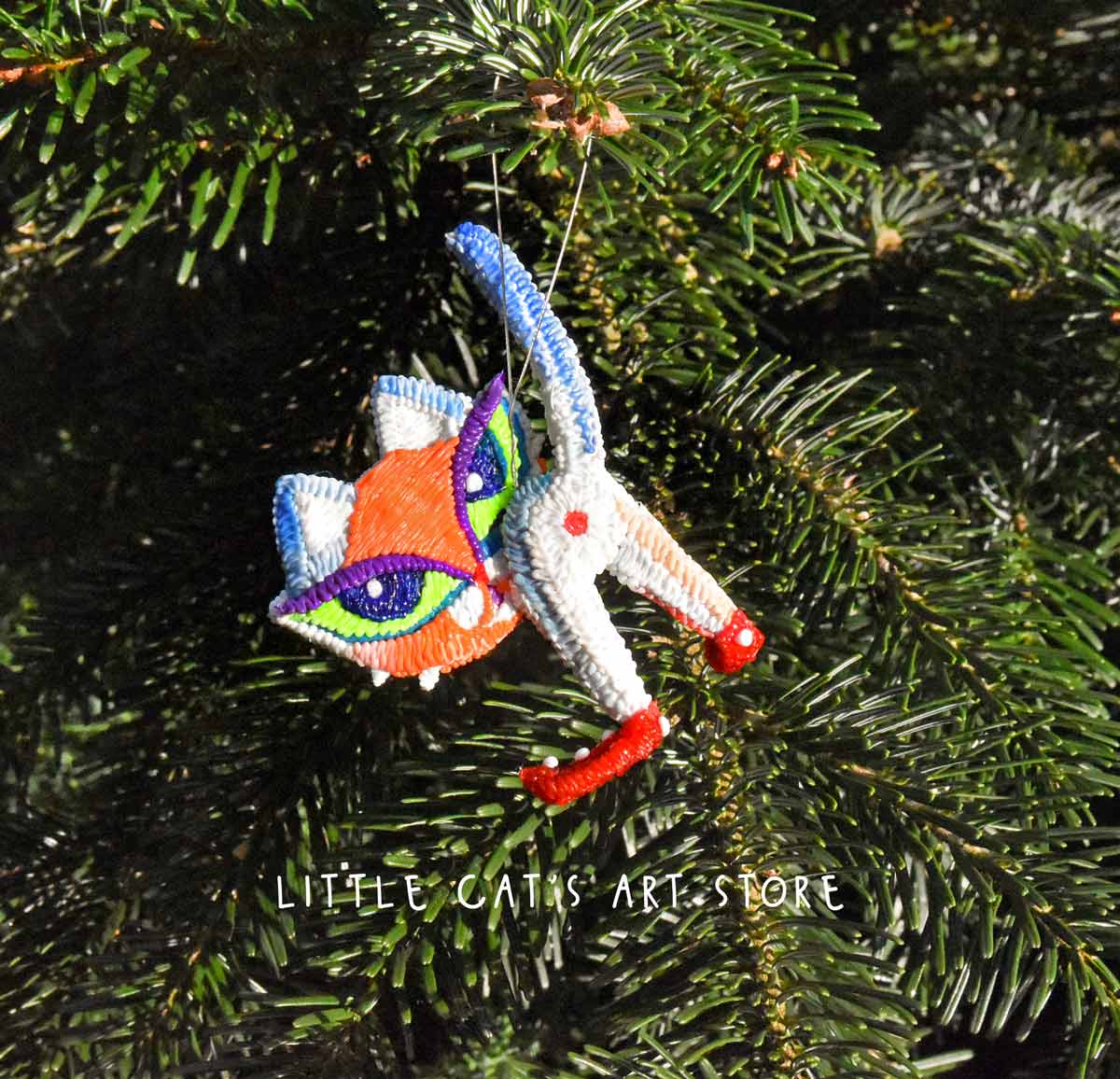 Two-faced cat for Christmas tree decoration