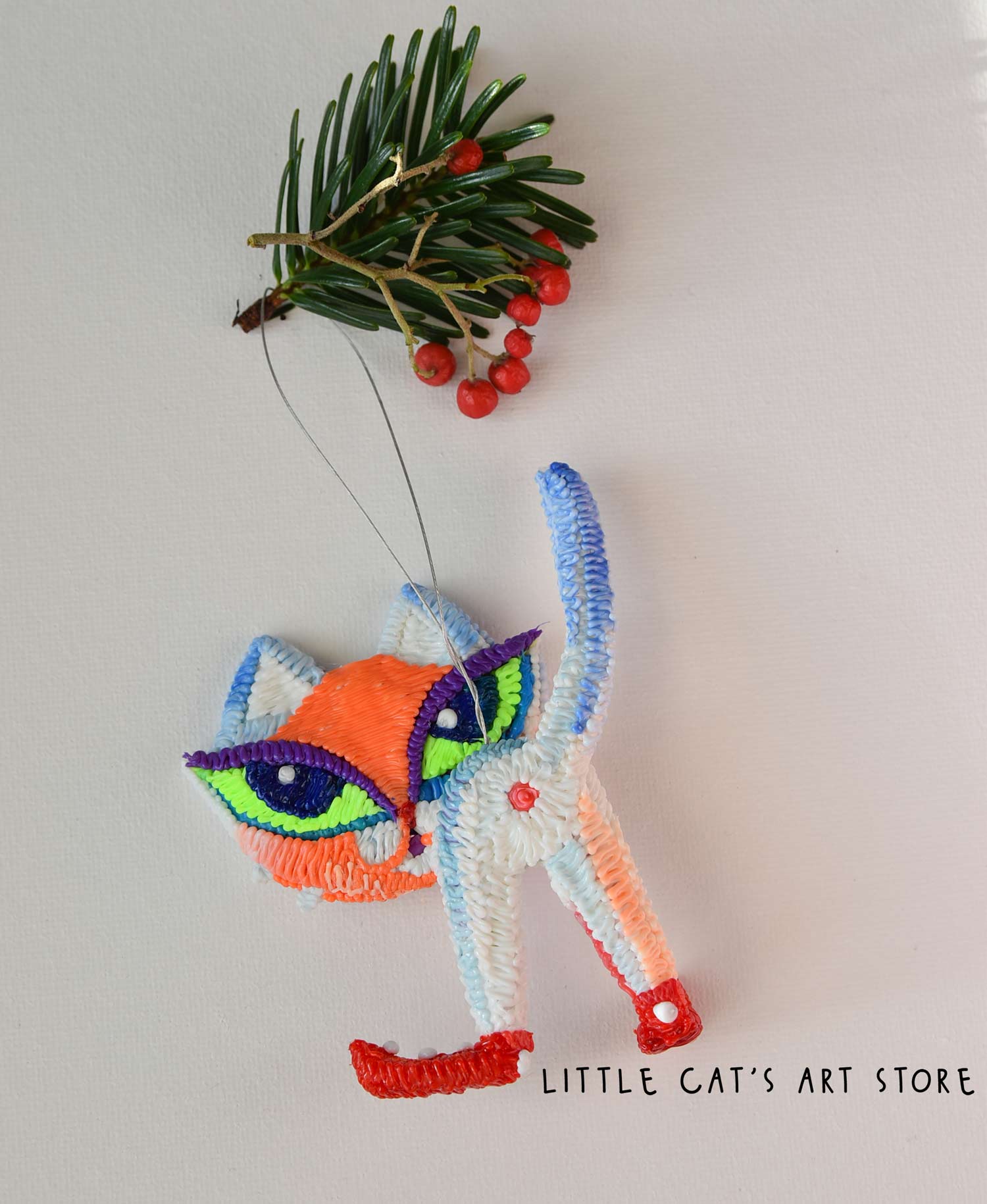 Two-faced cat for Christmas tree decoration