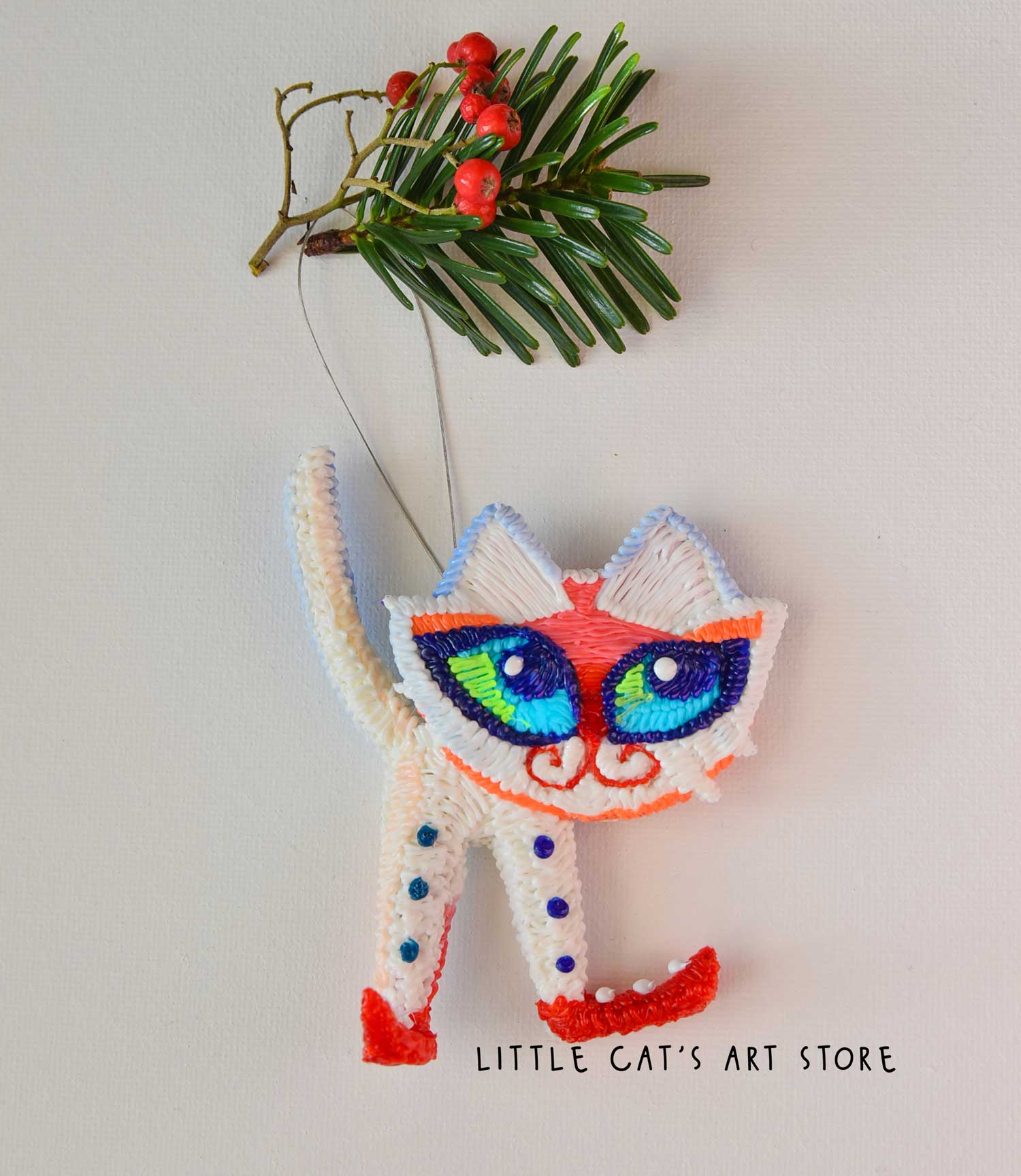 Two-faced cat for Christmas tree decoration