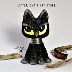 Black cat queen with metal choker and yellow eyes