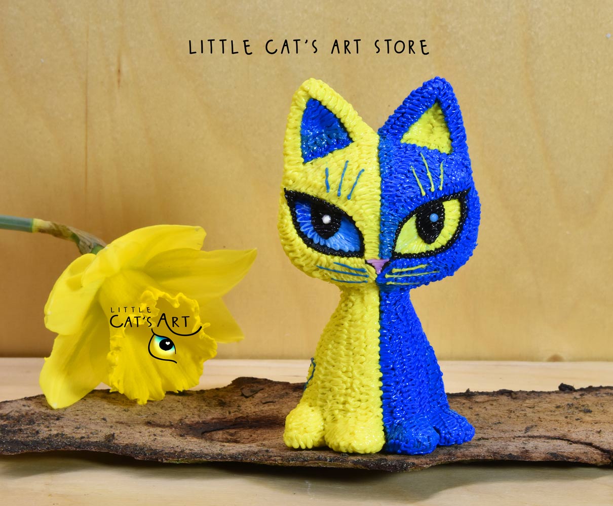 Ukrainian flag cat figurine for peaceful mood
