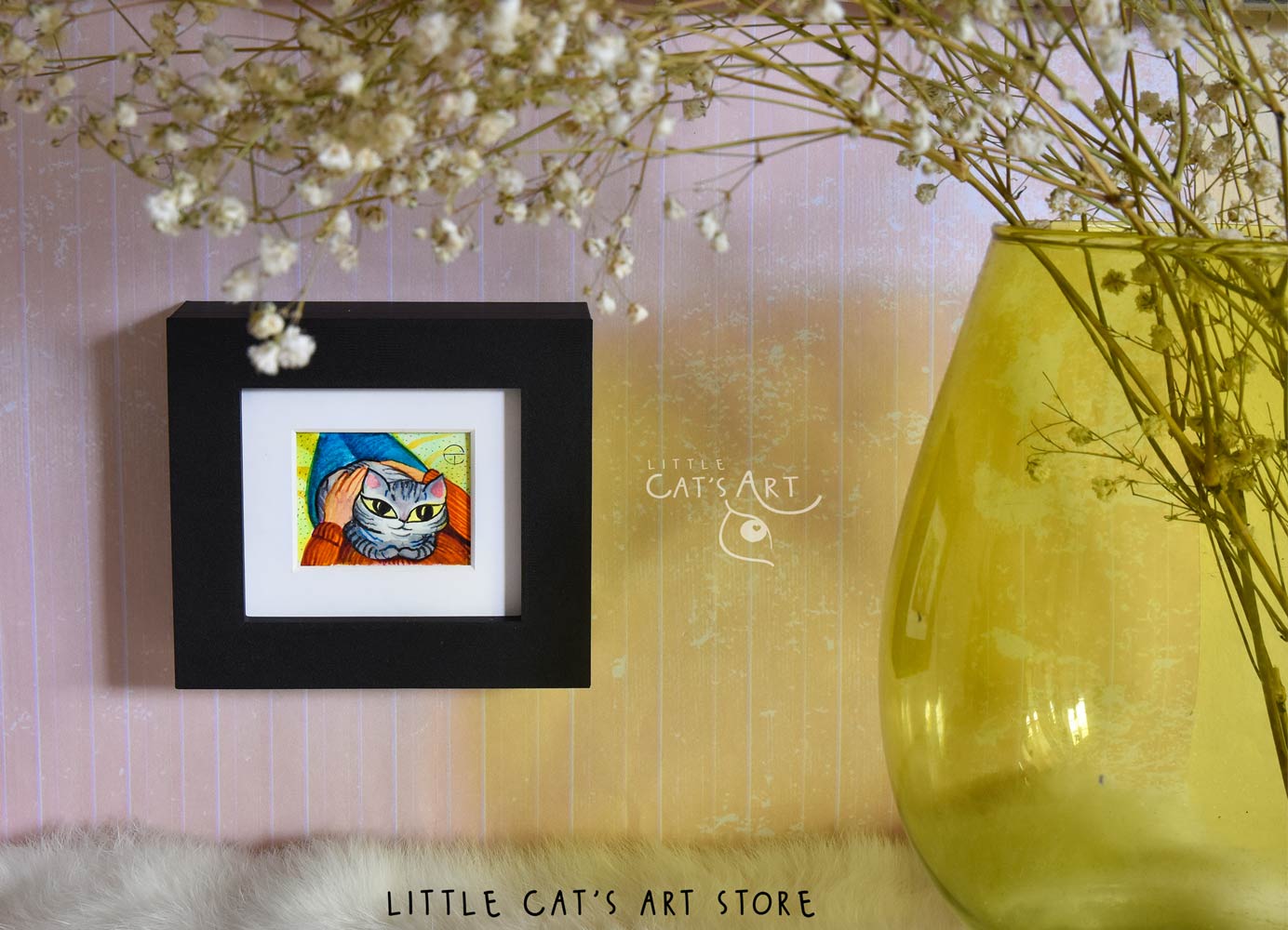 Grey tabby cat in owner's lap painting