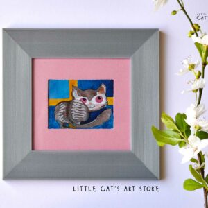 Grey tabby chilling in front of the Swedish flag watercolour