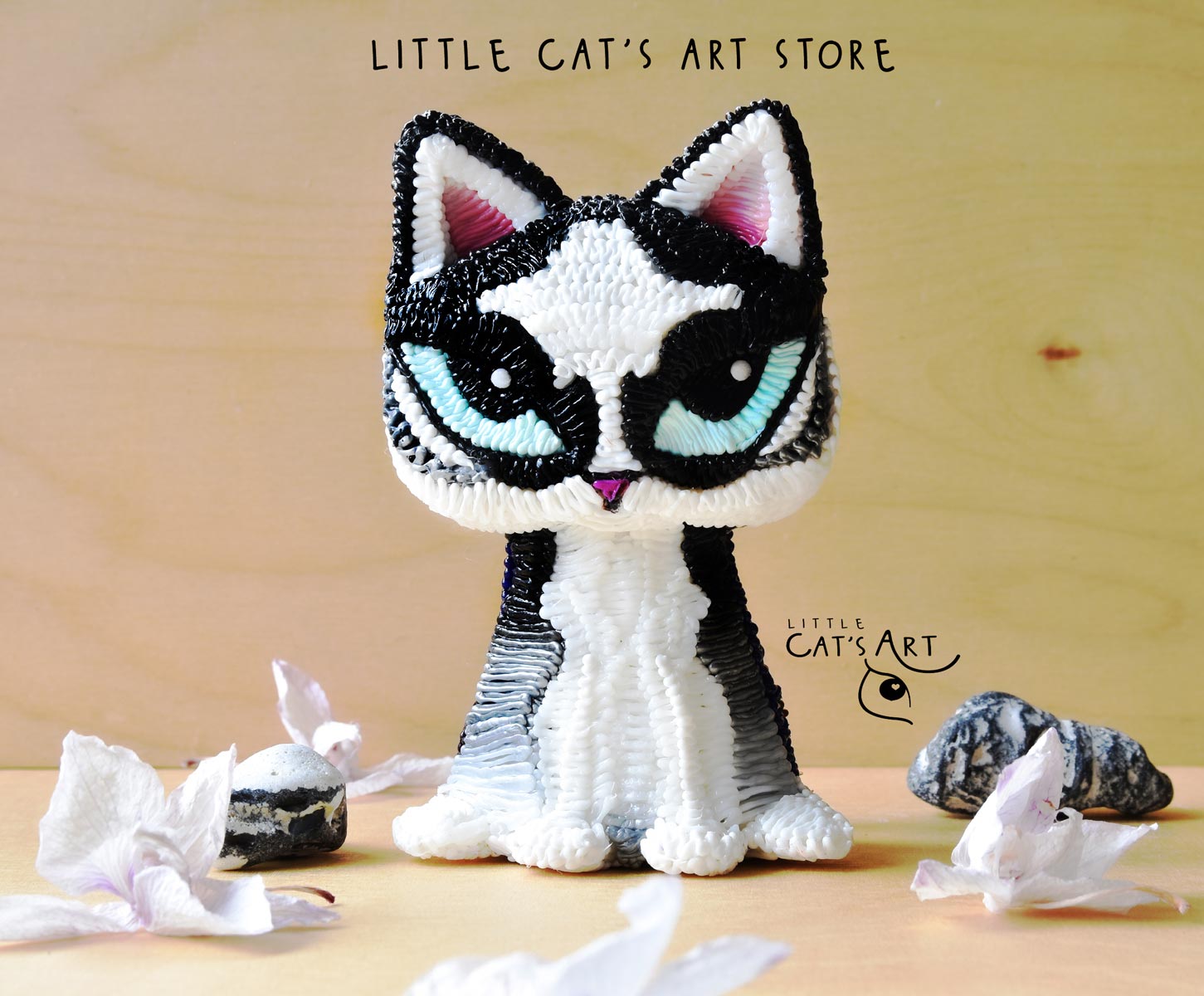 Husky cat figurine with bright blue eyes