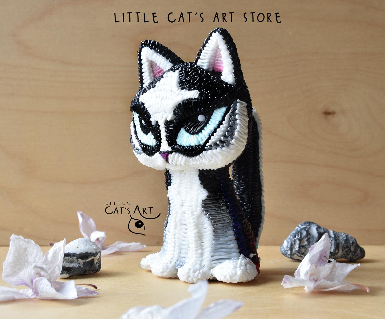 Husky cat figurine with bright blue eyes