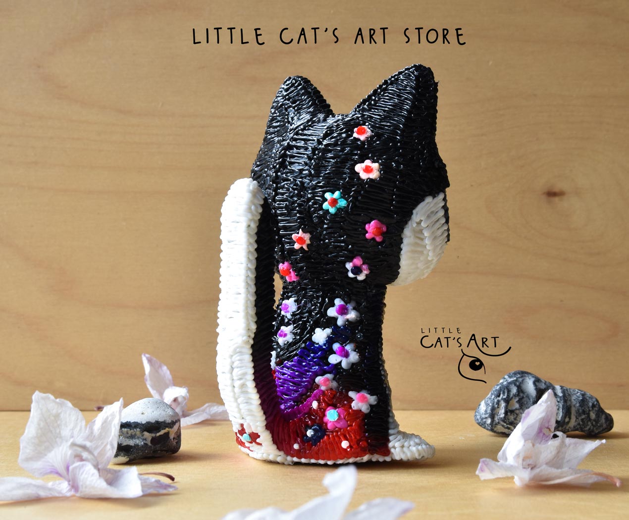Husky cat figurine with bright blue eyes