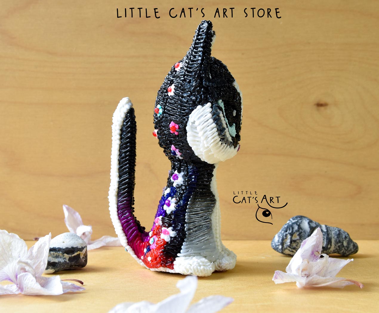 Husky cat figurine with bright blue eyes