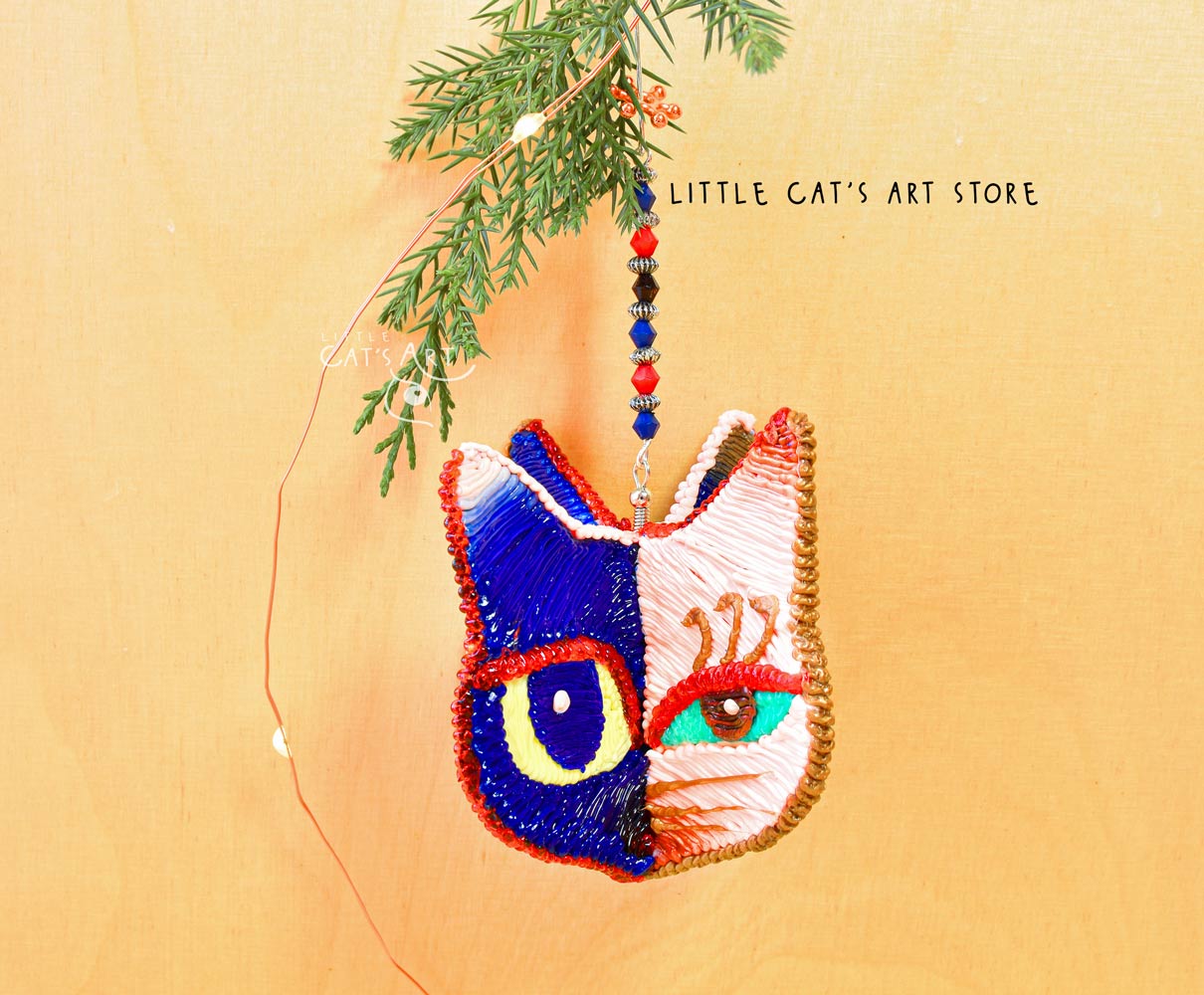 Night Day face winking cat ornament