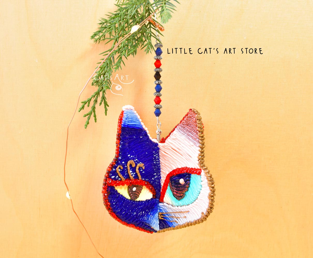 Night Day face winking cat ornament