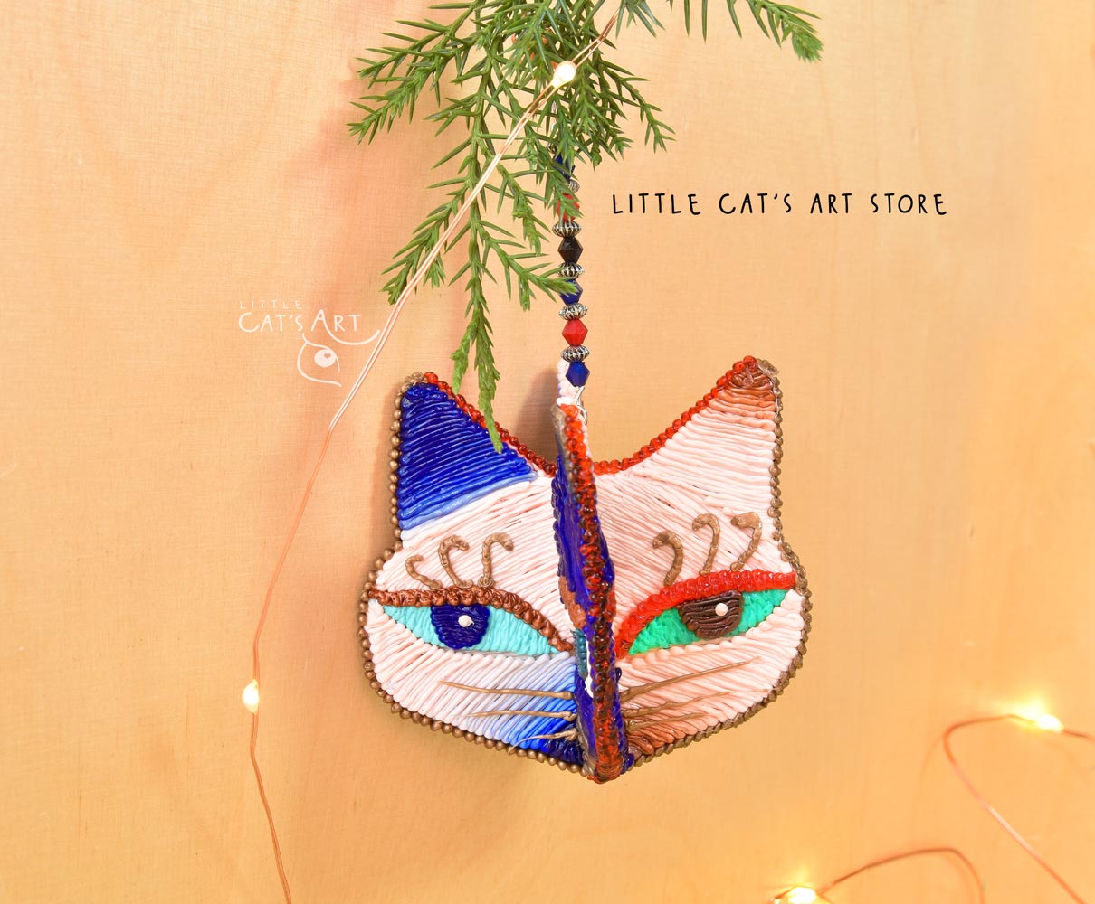 Day face winking cat ornament