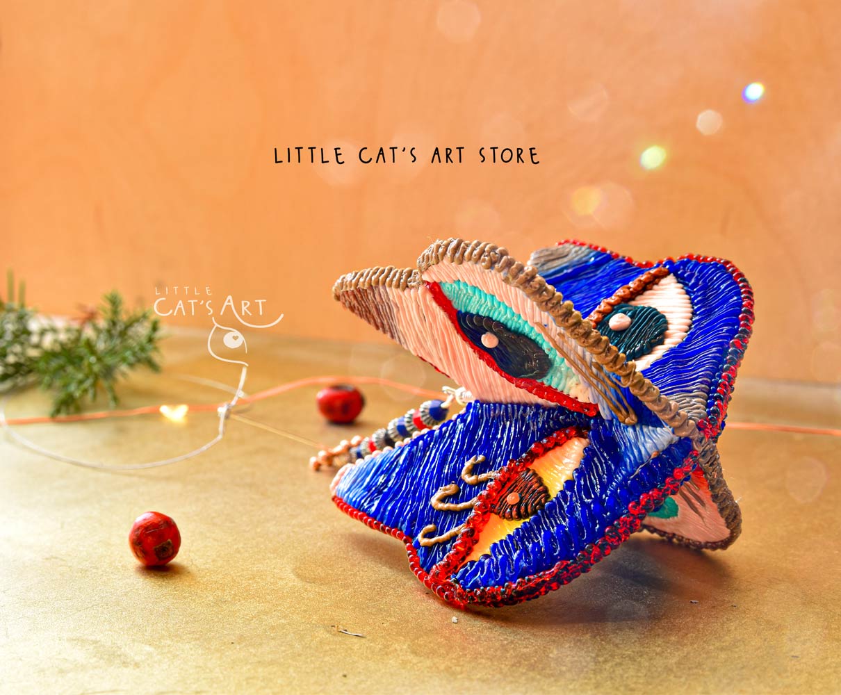 Day face winking cat ornament
