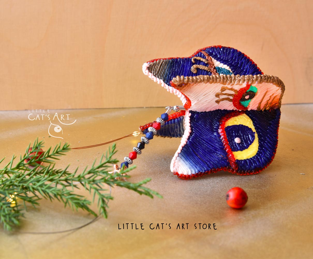 Day face winking cat ornament