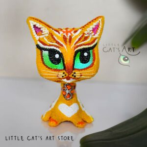 orange foxy cat figurine