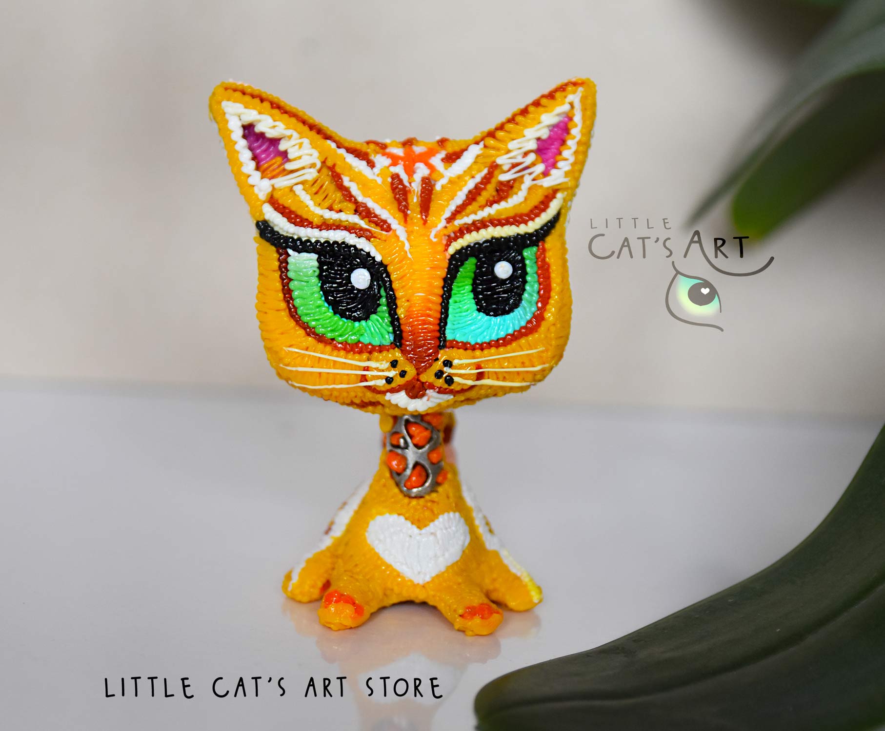 orange foxy cat figurine