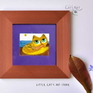 Yellow grooming feline on the beach