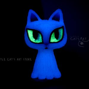 Glow-in-the-dark ghost cat figurine