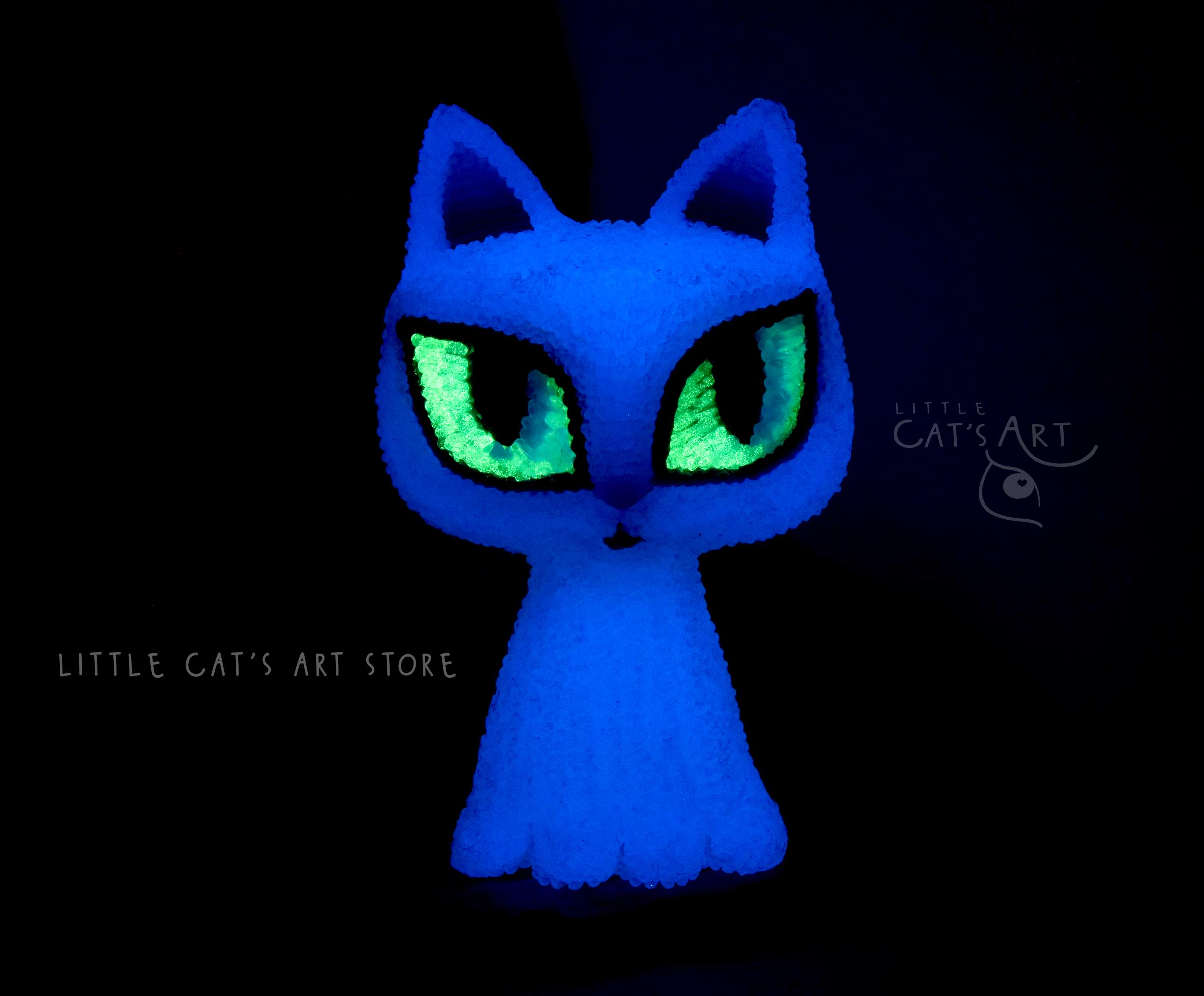 Glow-in-the-dark ghost cat figurine