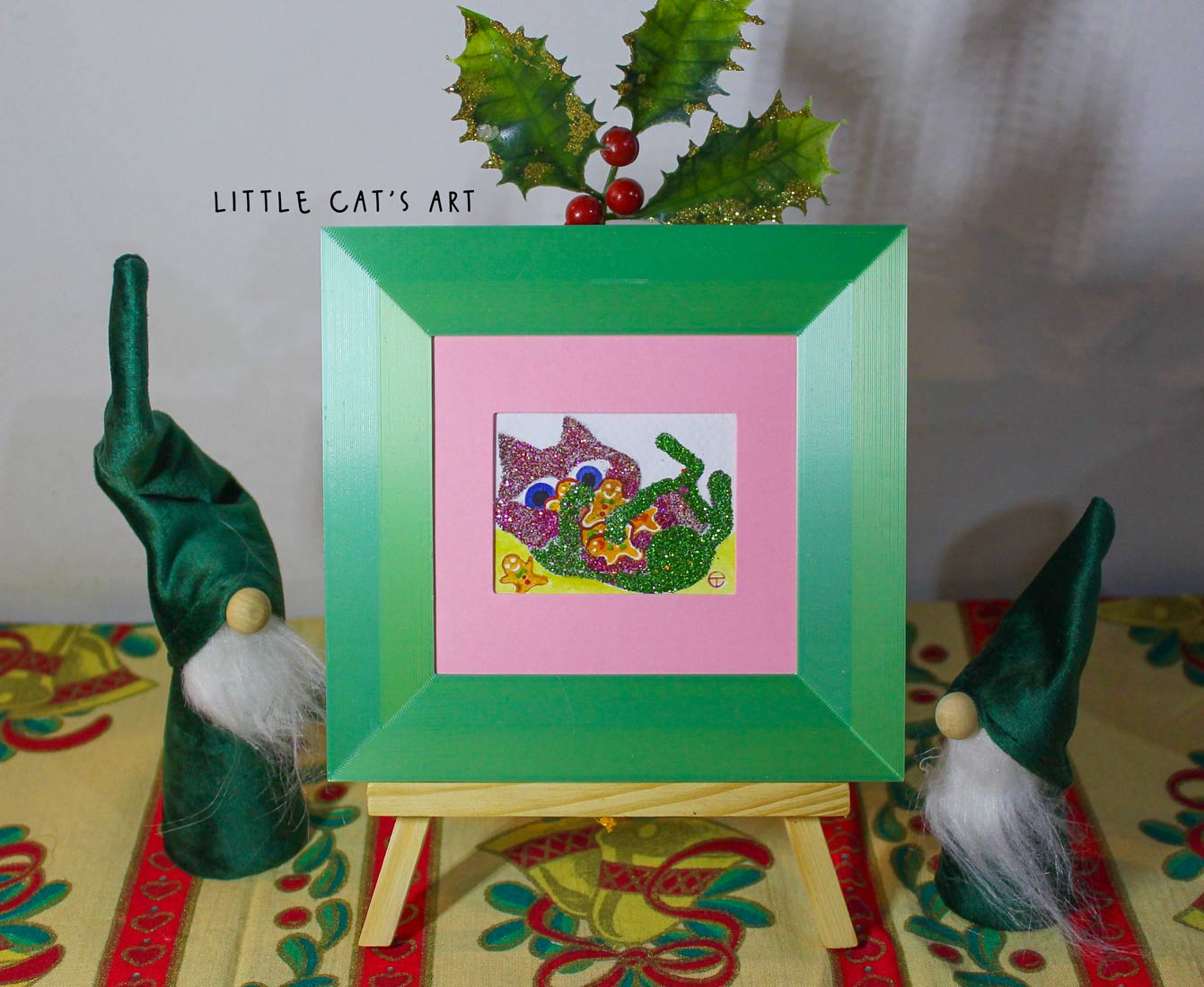 Pink-green shiny kitty cuddling Christmas cookies